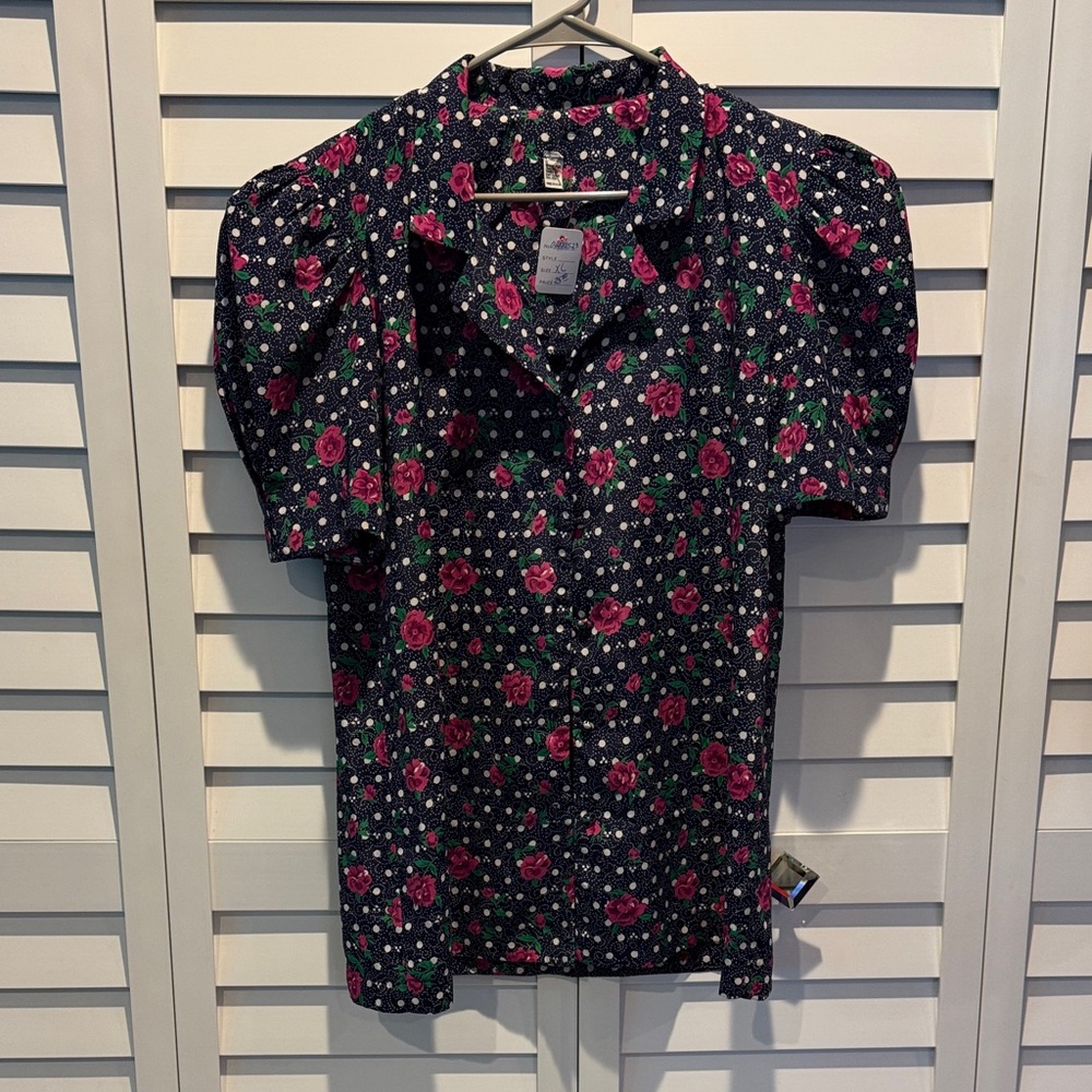 Buttoned down Floral Puff Sleeve Blouse with shoulder Pads.